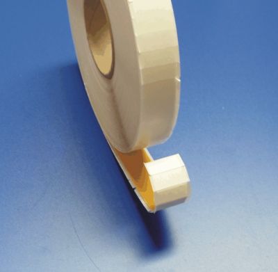 Double-sided foam pads on a roll